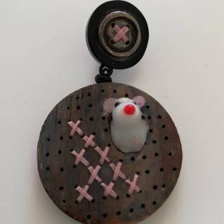 "'Pick- a- boo'' earrings